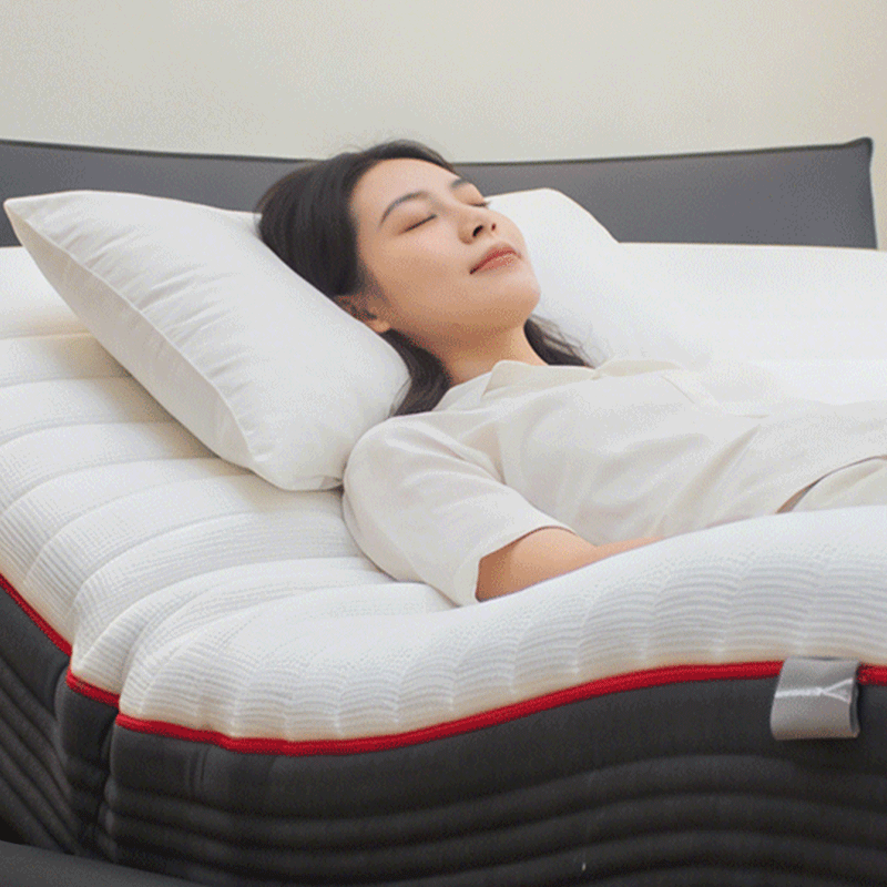 This image shows a woman lying on an electric smart mattress